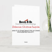 ドーベルマン犬のクリスマスの驚き シーズンカード (裏面)