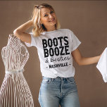 ナッシュビルバチェロレッテブーツブーズベスティーズカスタム Tシャツ<br><div class="desc">完璧なバチェロレッテ贈り物を？ナッシュビルのバチェロレッテは手の込んだカスタムTシャツだ！このシ笑わされるャツは彼女の次の結婚祝のための完璧である。シャツは素材で作高品質られ、必ずバチェロレッテスマイルを作る。このシャツとおもしろいしかユニークないが、お客様の支素晴らし援を示す方法でもある。ナッシュビルのバチェロレッテカスタムのTシャツは花嫁に最適なプレゼント！</div>