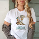ナッシュビルラストロデオブーツバチェロレッテ Tシャツ<br><div class="desc">ナッシュビル最後のロデオブーツバチェロレッテTシャツはNash Bashに最適!愛らしいフローラブーツこのバチェロレッテの好意をアクセント。</div>