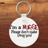 ナースおもしろいTシャツ「薬を飲ませるな」 キーホルダー (正面)