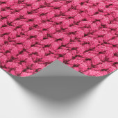 ニットのピンク色の背景。糸のテクスチャ。垂直kn ラッピングペーパー (角)