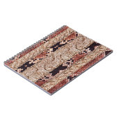 ニットウェアテクスチャ、幾何学的スネークパターン。 ノートブック (左側)