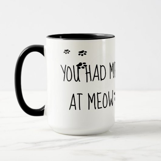 ニャーで食べられてかわいい マグカップ (左)