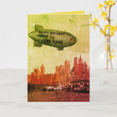 ニューヨークシティの30年代のスカイラインの軟式小型飛行船あなたの誕生日 カード (黄色い花)