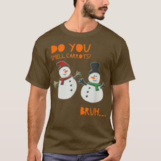 ニンジンの匂いを嗅いで可愛いおもしろい雪だるまクリスマ Tシャツ