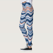 ネイビーとオレンジの波ストライプ線 レギンス (左)