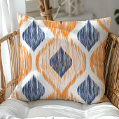 ネイビーブルーとオレンジオギーイカットパターン クッション