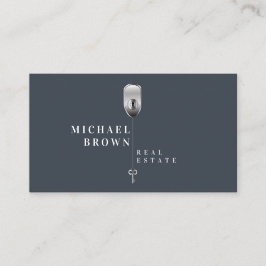 ネイビーモダンメタリック鍵実在エテート 名刺 (正面)