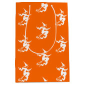 ネオンオレンジ色の魔女シルエット ミディアムペーパーバッグ (正面)