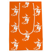 ネオンオレンジ色の魔女シルエット ミディアムペーパーバッグ (裏面)