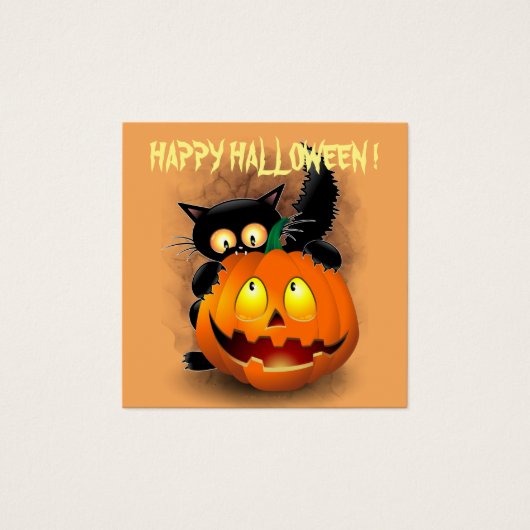 ネコおもしろいハロウィーンキャラクターカボチャをかむ (正面)