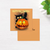 ネコおもしろいハロウィーンキャラクターカボチャをかむ (デスク)