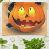ネコおもしろいハロウィーンキャラクターカボチャをかむ キッチンタオル (折り畳み)