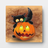 ネコおもしろいハロウィーンキャラクターカボチャをかむ フォトプラーク (正面)