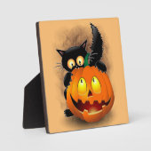 ネコおもしろいハロウィーンキャラクターカボチャをかむ フォトプラーク (正面)