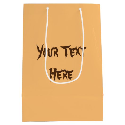 ネコおもしろいハロウィーンキャラクターカボチャをかむ ミディアムペーパーバッグ (裏面)