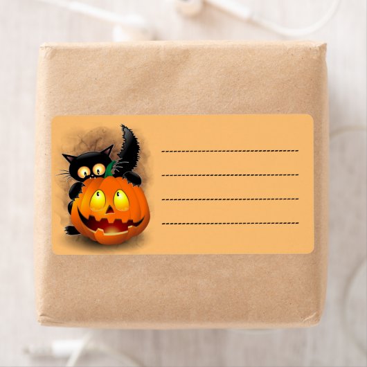 ネコおもしろいハロウィーンキャラクターカボチャをかむ ラベル (インサイチュ)