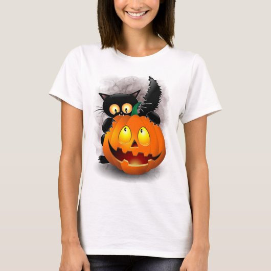 ネコおもしろいハロウィーンキャラクターカボチャをかむ Tシャツ (正面)