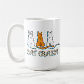 ネコ熱狂するオレンジタビー猫 コーヒーマグカップ (左)
