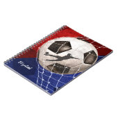 ネットの赤い青い女の子のサッカーをへこませるサッカーボール ノートブック (左側)