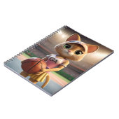 ネットボールの雌猫。 ノートブック (左側)