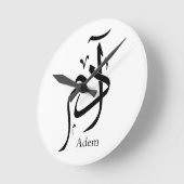 ノム・アダム・アン・カリラヒー・アラベ， ادم ラウンド壁時計 (傾斜)