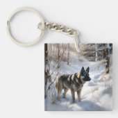 ノルウェーのエルクハウンドがそれを雪のクリスマスに許す キーホルダー (正面)