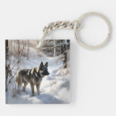 ノルウェーのエルクハウンドがそれを雪のクリスマスに許す キーホルダー (裏面)