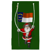 ノースカロライナの看板を持つサンタクロース スモールペーパーバッグ (正面)