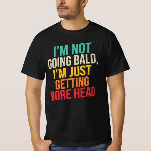 ハゲてなんかいない、頭が大きくなるのだ Tシャツ (正面)