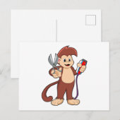 ハサミとカミソリを持った猿の美容師 ポストカード (正面/裏面)