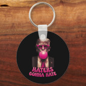 ハターズはトランプおもしろいバブルガムを嫌うドナルドTr キーホルダー (正面)