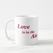 ハチドリのカップケーキ愛は空気にあります コーヒーマグカップ (左)