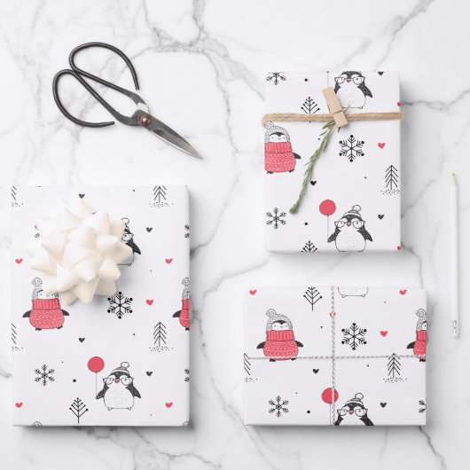 ハットホワイトに登場するメリークリスマスかわいいハッピーペンギン ラッピングペーパーシート (正面)