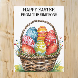 ハッピーイースターの水色色彩の鮮やか卵バスケット家族 ポストカード