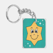 ハッピーカートゥーンスター顔スマイル、クリスマスデザイン キーホルダー (正面左)