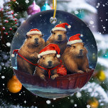 ハッピーキャピバラクリスマス セラミックオーナメント<br><div class="desc">このデザインはパーソナライズされた、[編集]デザインを選択して行う。他のアイテムに転送することもできます。colorflowcreations@gmail.comで連絡は、このデザインを別の製品で使用するもしか、サポートが必要な場合は、ページの上部にあるチャットオプションを使用する。www.facebook.com/colorflowcreations、www.instagram.com/colorflowcreations、www.twitter.com/colorflowart、後を追およびwww.pinterest.com/colorflowcreationsで自分のデザインや自分の情報を見る。</div>