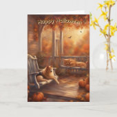 ハッピーハローウィン猫と犬が玄関に乗っている カード (黄色い花)