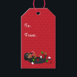 ハッピーHOWLidays Cute Dachshand Christmas ギフトタグ<br><div class="desc">ハッピーHOWLidays Cute Dachshandクリスマスギフトラベル。可愛いダックスシュントが口にキャンディーケーンを入れたクリスマスライトの列に絡み合った。おもしろい、ユーモアのある休日ラベル愛犬家に最適。</div>