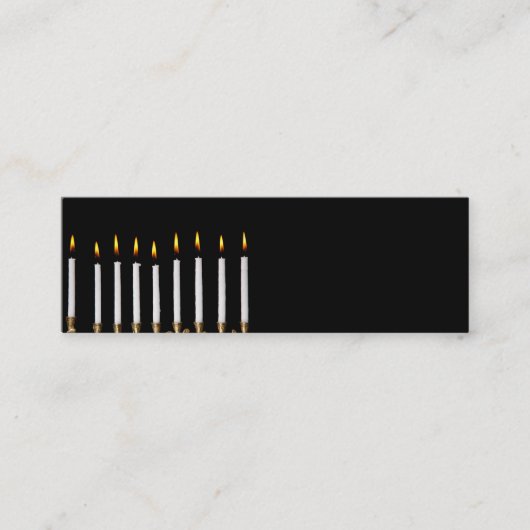 ハヌカーの(ユダヤ教)メノラーの燃焼白はハヌカー(ユダヤ教の祭り)の良否を明りにすかして調べます スキニー名刺 (正面)