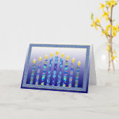 ハヌカーの(ユダヤ教)メノラーはカードの良否を明りにすかして調べます カード (黄色い花)