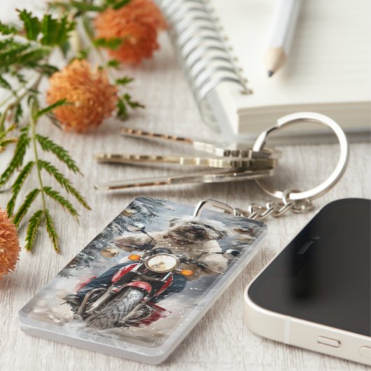 ハバニーズ犬がオートバイクリスマスに乗る キーホルダー (正面右)