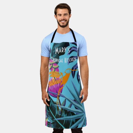 ハミングバードと明るい熱帯の葉のパターン エプロン (着用した状態)