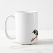 ハミングバード三羽が小花の枝に止まった コーヒーマグカップ (左)