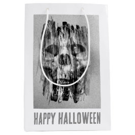 ハロウィンおめでとう。ボロボロのドクロ ミディアムペーパーバッグ