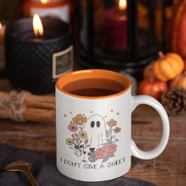 ハロウィンのおばけと花の面白いマグカップ ツートーンマグカップ