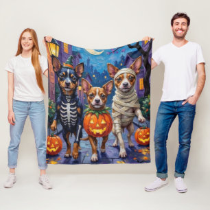 ハロウィンのお菓子をもらいにくる狆の格好 フリースブランケット