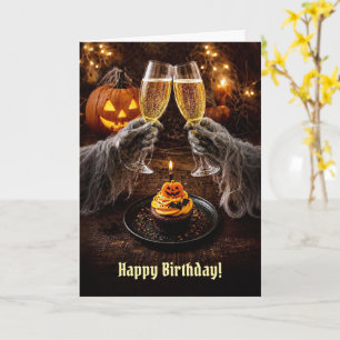 ハロウィンのお誕生日おめでとう カップケーキとシャンパン カード