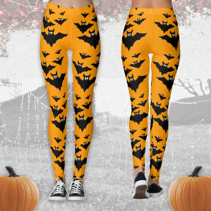 ハロウィンのかっこいい飛ぶコウモリ ブラックとオレンジ レギンス