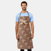 ハロウィンのかぼちゃのポットと秋の花のイラスト エプロン (着用した状態)